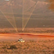The moment of impact on the desert floor.